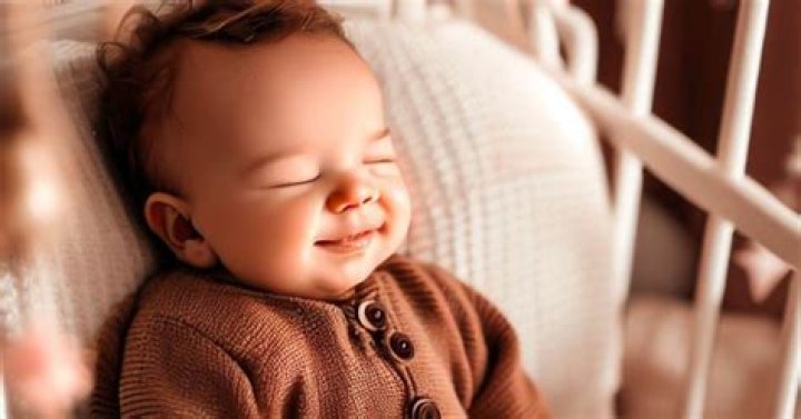 Why do babies smile when sleeping?